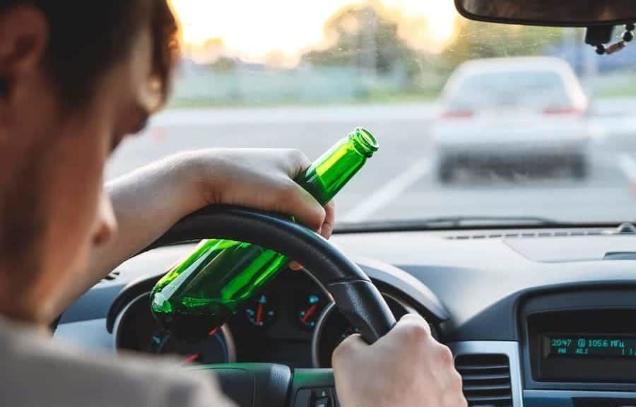 man-driving-drunk-with-beer
