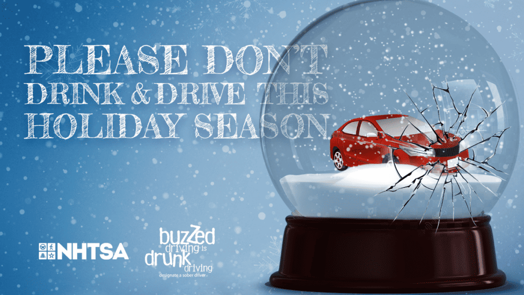 this is a photo of a snow globe saying "please don't drink and drive this holiday season"