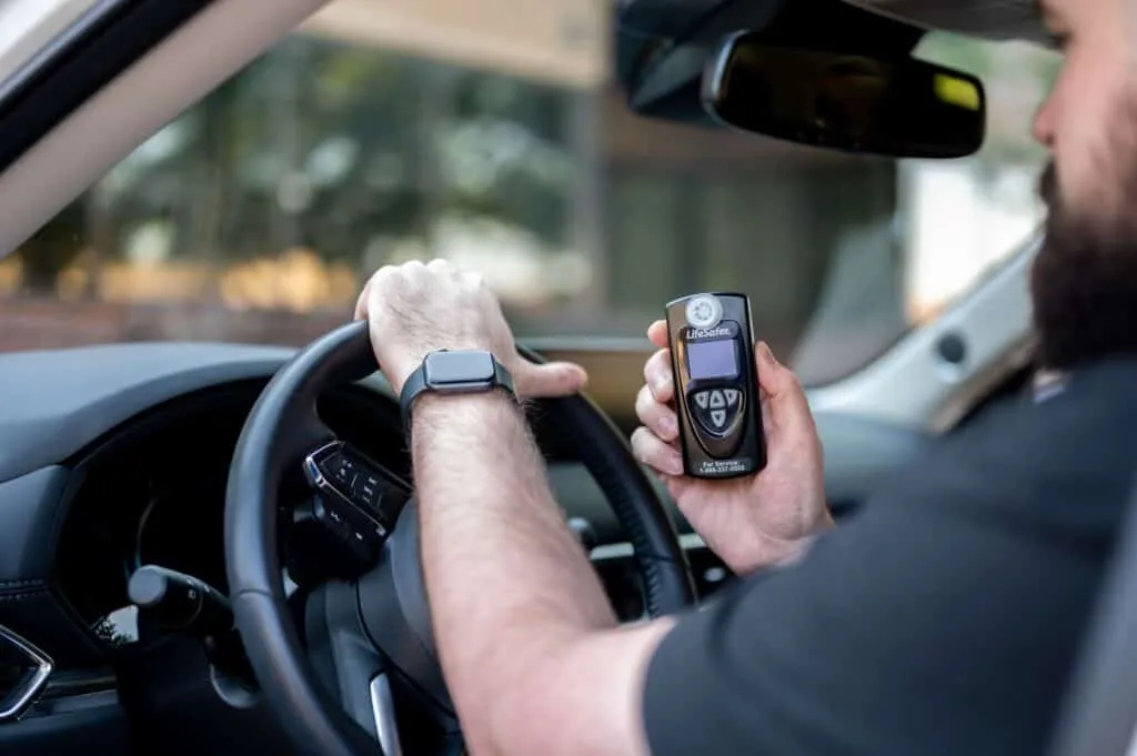 LifeSafer L250 Ignition Interlock Device LifeSafer L250: A compact and discreet ignition interlock device installed in a car.